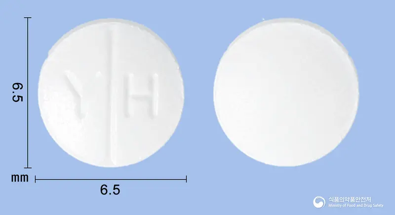 유한짓정100mg(이소니아지드)(군납명:이소니아지드정케이.피100밀리그람) 앞뒤 사진 (흰색 원형, 각인 Y H)