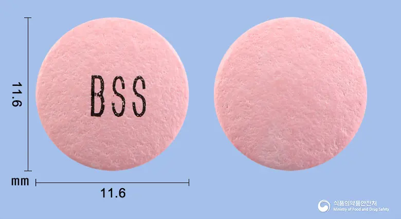 베스타제당의정 앞뒤 사진 (분홍색 원형, 각인 BSS)