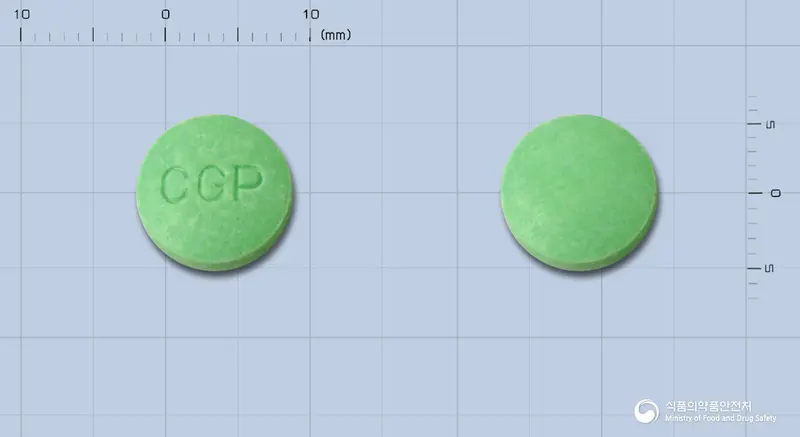 디메콘정(시메티콘) 앞뒤 사진 (초록색 원형, 각인 CGP)