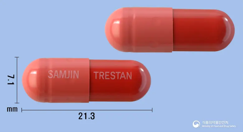 트레스탄캡슐 앞뒤 사진 (분홍색 캡슐, 각인 SAMJIN TRESTAN)