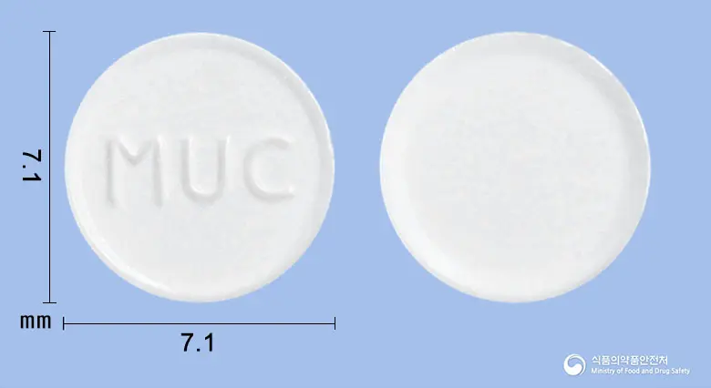 뮤코졸정(브롬헥신염산염) 앞뒤 사진 (흰색 원형, 각인 MUC)