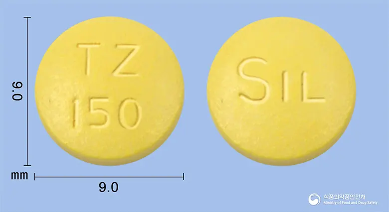 티니다진정(티니다졸) 앞뒤 사진 (노란색 원형, 각인 TZ150 / SIL)