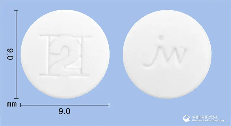 에취투정(시메티딘)(수출명:CIMETIDINETAB.200mg) 앞뒤 사진 (흰색 원형)
