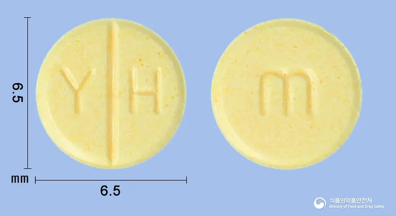 유한메토트렉세이트정 앞뒤 사진 (노란색 원형, 각인 Y H / m)
