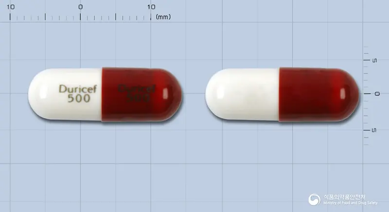 보령듀리세프캡슐500밀리그램(세파드록실수화물) 앞뒤 사진 (빨간색 캡슐, 각인 Duricef Duricef 500 500)