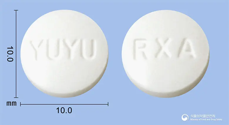 릴렉시아정(클로르페네신카르바메이트) 앞뒤 사진 (흰색 원형, 각인 YUYU / RXA)