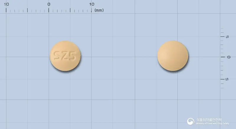 셀젠타정(세라티오펩티다제) 앞뒤 사진 (주황색 원형, 각인 SZ5)