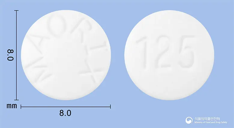 마오릭스정(클로르페네신카르바메이트) 앞뒤 사진 (흰색 원형, 각인 MAORIX / 125)