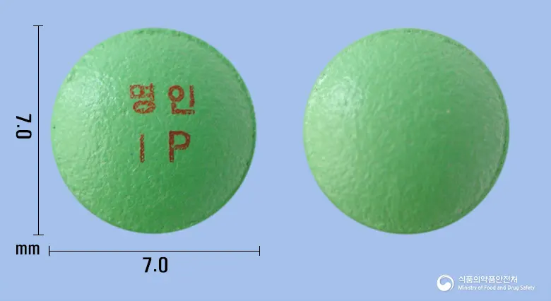 명인이미프라민염산염정 앞뒤 사진 (연두색 원형, 각인 명인IP)