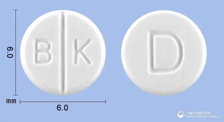 부광디유렉산정(지파미드) 앞뒤 사진 (흰색 원형, 각인 B K / D)