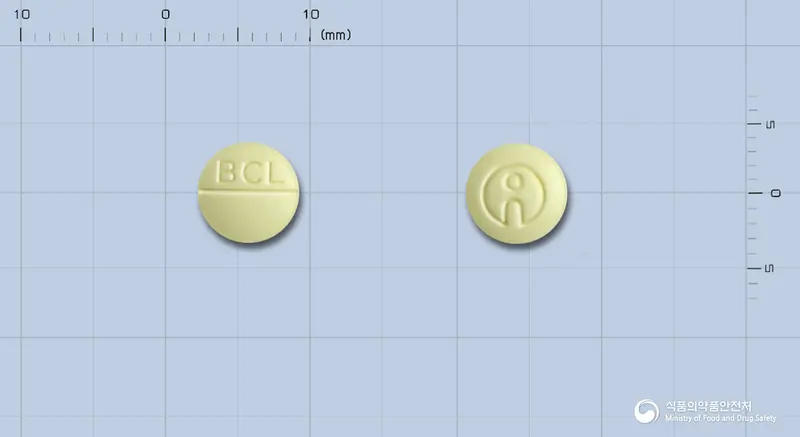 바클란정10밀리그램(바클로펜) 앞뒤 사진 (연두색 원형, 각인 BCL)