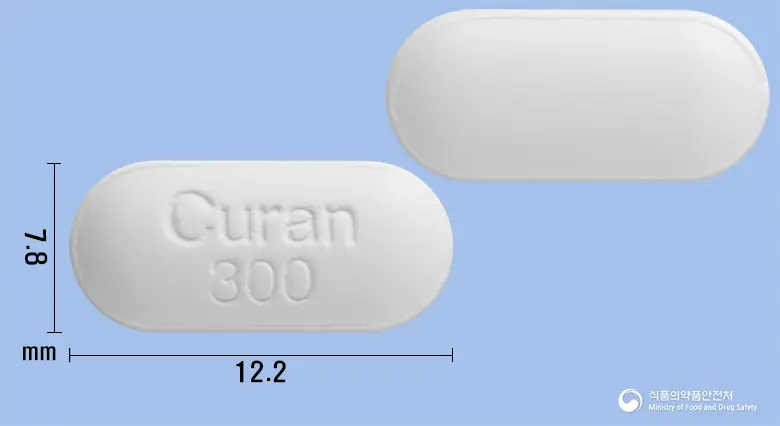 큐란정300밀리그램(라니티딘염산염) 앞뒤 사진 (흰색 장방형, 각인 Curan 300)