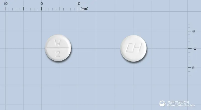 대화와르파린나트륨정2밀리그램 앞뒤 사진 (흰색 원형, 각인 W 2)