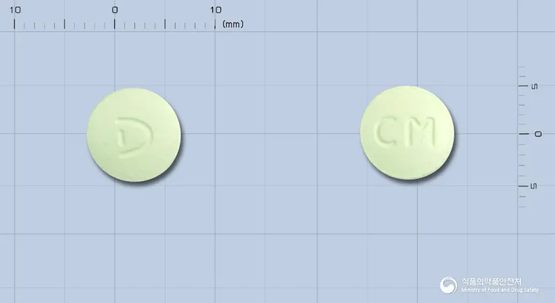 다림시메티딘정200mg 앞뒤 사진 (연두색 원형, 각인 CM)
