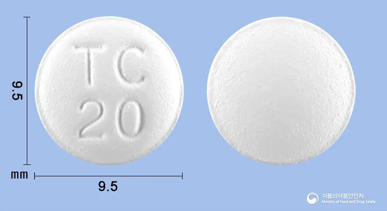 타목센정20밀리그램(타목시펜시트르산염)(수출명:Tamooex Tabs.20mg,XifenTabs.20mg,GyraxenTabs.20mg) 앞뒤 사진 (흰색 원형, 각인 TC20)