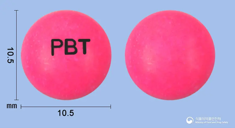 제스타제정(알리벤돌)(수출용) 앞뒤 사진 (분홍색 원형, 각인 PBT)