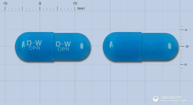 동화세프라딘캡슐(세프라딘수화물) 앞뒤 사진 (파란색 캡슐, 각인 D-W D-WCPR CPR)