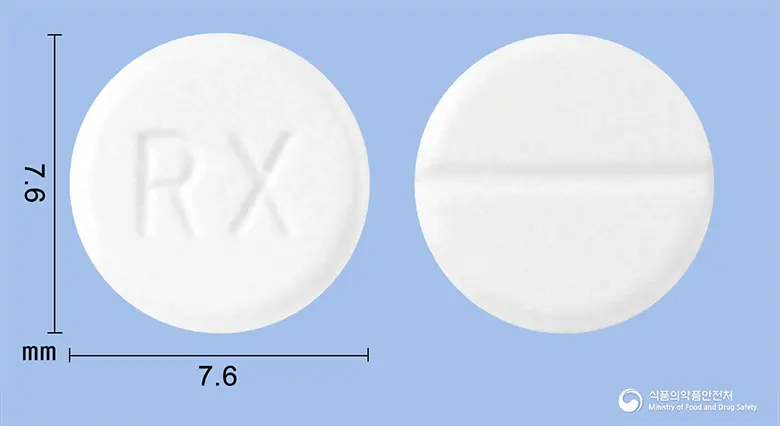 록솔정(암브록솔염산염) 앞뒤 사진 (흰색 원형, 각인 RX)