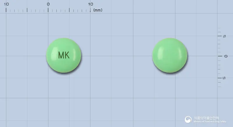 티목산정(염산치목사민) 앞뒤 사진 (초록색 원형, 각인 MK)