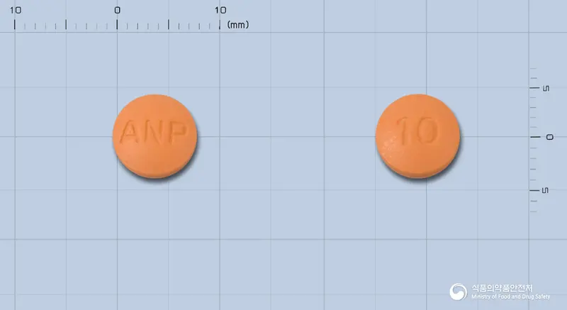 아리제정10밀리그람(세라티오펩티다제)(수출명:DanzaseTablet10mg) 앞뒤 사진 (주황색 원형, 각인 ANP / 10)