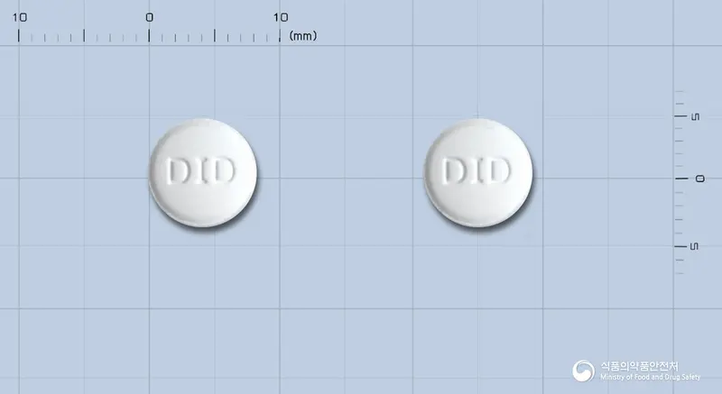 말레부틴정(트리메부틴말레산염) 앞뒤 사진 (흰색 원형, 각인 DID / DID)