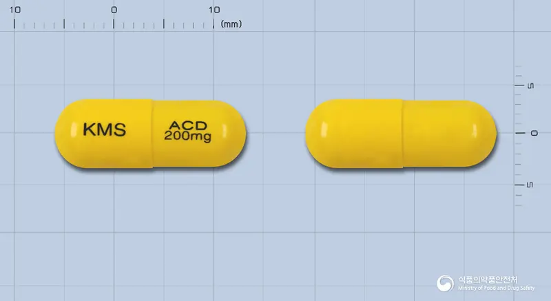 아신돌캡슐200밀리그램(에토돌락)(수출용) 앞뒤 사진 (노란색 캡슐, 각인 KMS ACD 200mg)