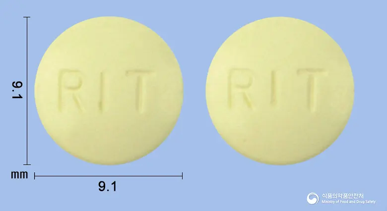 리메시드정(니메술리드)(수출명 : SHIN POONG NIMESULIDE Tablet 100mg)(수출용) 앞뒤 사진 (노란색 원형, 각인 RIT / RIT)