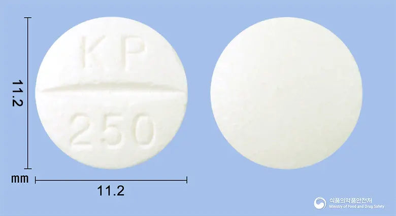 키포신정(시프로플록사신염산염수화물) 앞뒤 사진 (흰색 원형, 각인 KP 250)