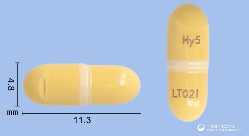 올데카캡슐5밀리그램(바니디핀염산염) 앞뒤 사진 (주황색 캡슐, 각인 Hy5LT021)