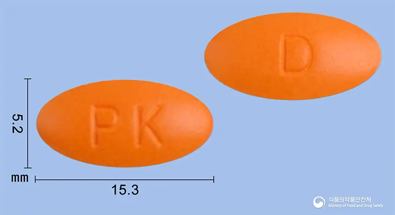 파비스이부프로펜정400mg 앞뒤 사진 (주황색 타원형, 각인 PK / D)