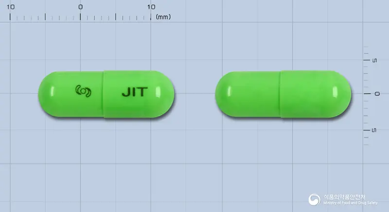자이트캅셀 앞뒤 사진 (연두색 캡슐, 각인 JIT)