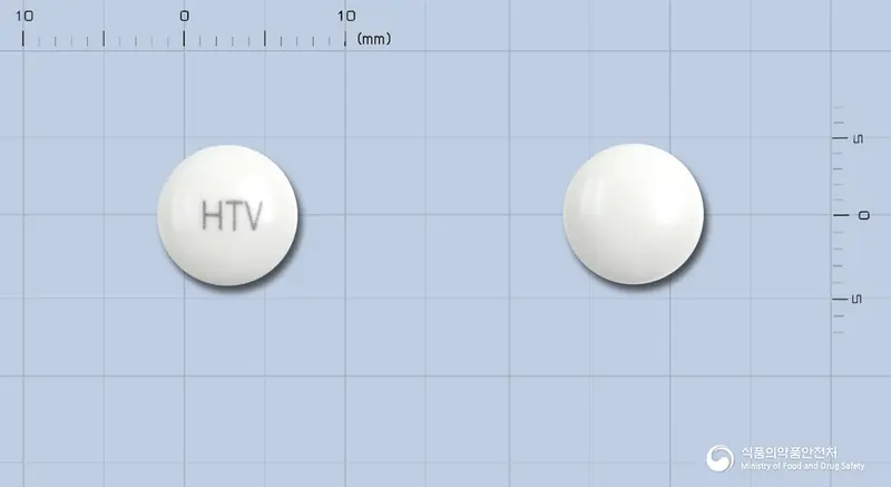 베몬정(카로베린) 앞뒤 사진 (흰색 원형, 각인 HTV)