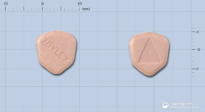 조이렉스정400밀리그램(아시클로버)(수출명:HerpexTabs.400mg) 앞뒤 사진 (분홍색 기타, 각인 ZOYLEX)