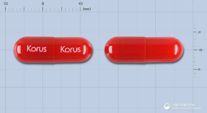 네가펜캡슐(수출용) 앞뒤 사진 (빨간색 캡슐, 각인 Korus Korus)