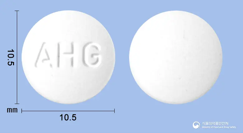 게루삼엠정(건조수산화알루미늄겔) 앞뒤 사진 (흰색 원형, 각인 AHG)