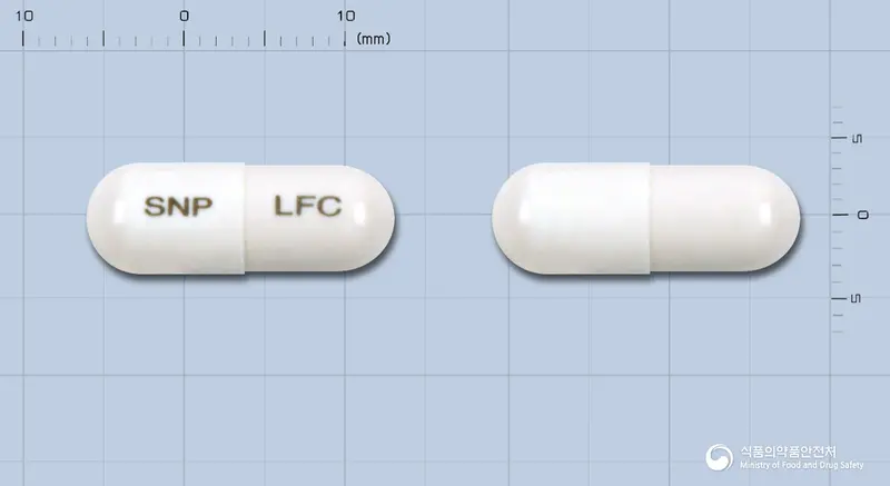 락토프리캡슐(락토바실루스아시도필루스균틴달화동결건조물)(수출명:LACTOFREE Cap) 앞뒤 사진 (흰색 캡슐, 각인 SNP LFC)