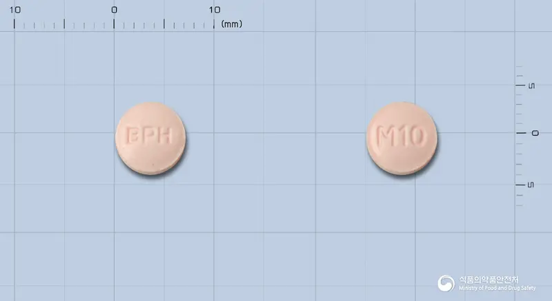 보람염산암브록솔정(염산암브록솔) 앞뒤 사진 (분홍색 원형, 각인 BPH / M10)