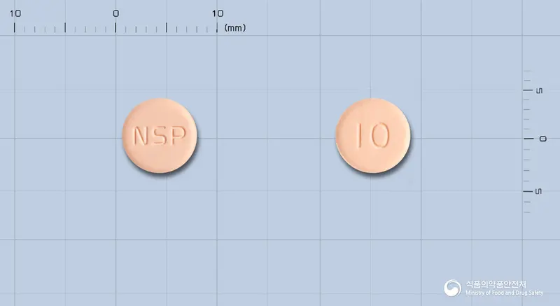 베라제정(스트렙토키나제·스토렙토도르나제) 앞뒤 사진 (주황색 원형, 각인 NSP / 10)