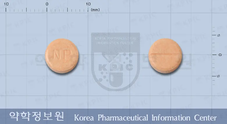 니막스정(니메슬리드)(수출용) 앞뒤 사진 (주황색 원형, 각인 NP)