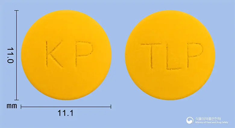 탈페인정(탈니플루메이트) 앞뒤 사진 (주황색 원형, 각인 KP / TLP)