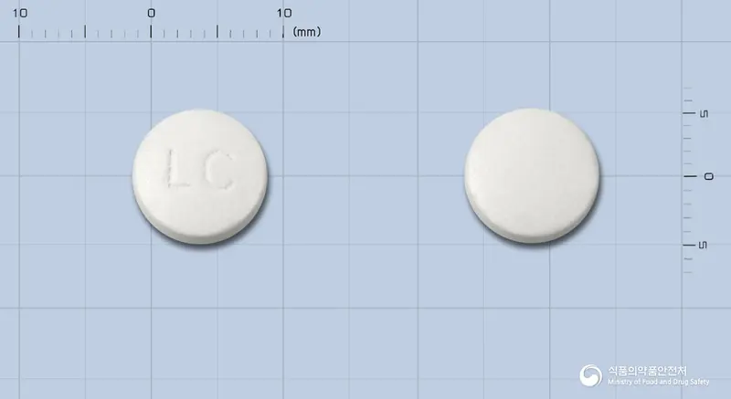 락토민정(락토바실루스아시도필루스균틴달화립) 앞뒤 사진 (흰색 원형, 각인 LC)