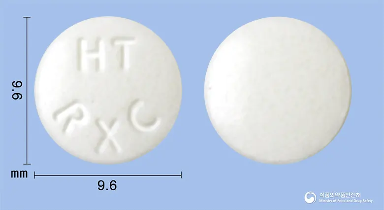 록사신정(록시트로마이신) 앞뒤 사진 (흰색 원형, 각인 HTRXC)