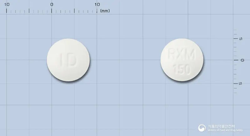 일동록시트로마이신정(수출명:록손정,일록손정,일록솜정) 앞뒤 사진 (흰색 원형, 각인 ID / RXM150)