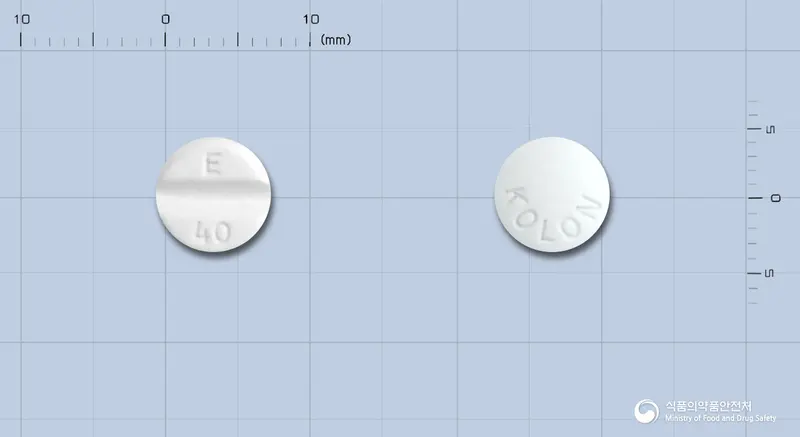 앤지비드서방정40mg(묽은이소소르비드이질산염) 앞뒤 사진 (흰색 원형, 각인 E 40 / KOLON)