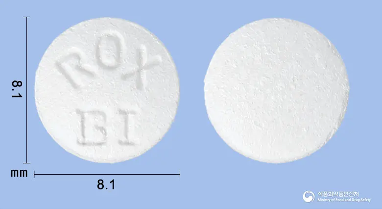 로페신정(록시트로마이신) 앞뒤 사진 (흰색 원형, 각인 ROXBI)