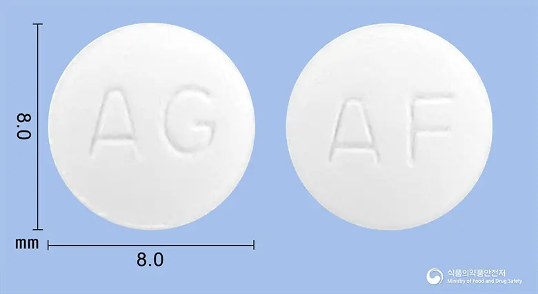 아세페낙정(아세클로페낙) 앞뒤 사진 (흰색 원형, 각인 AG / AF)