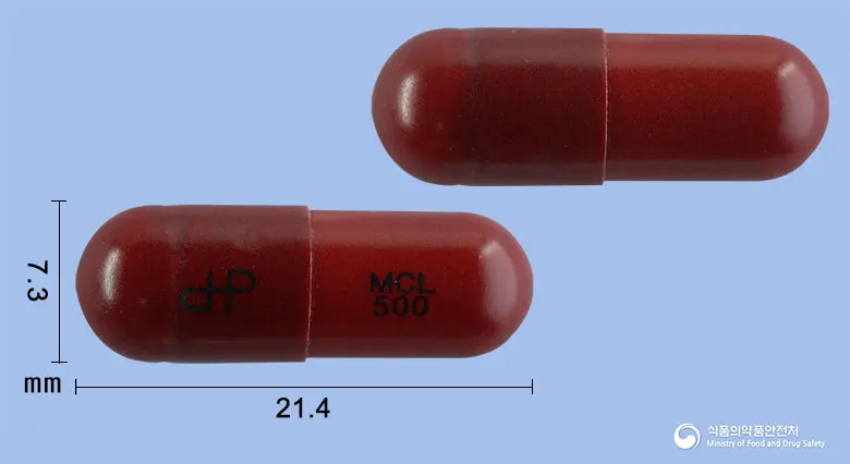 세파메칠캡슐(메틸올세팔렉신리시네이트)[수출명:CMP,CEPHAMETHYL) 앞뒤 사진 (빨간색 캡슐, 각인 MCL 500)