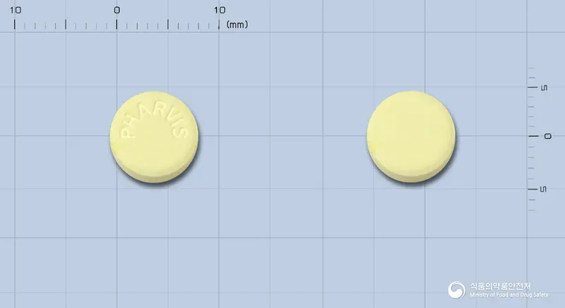 파비스푸마르산케토티펜정(수출용) 앞뒤 사진 (노란색 원형, 각인 PHARVIS)