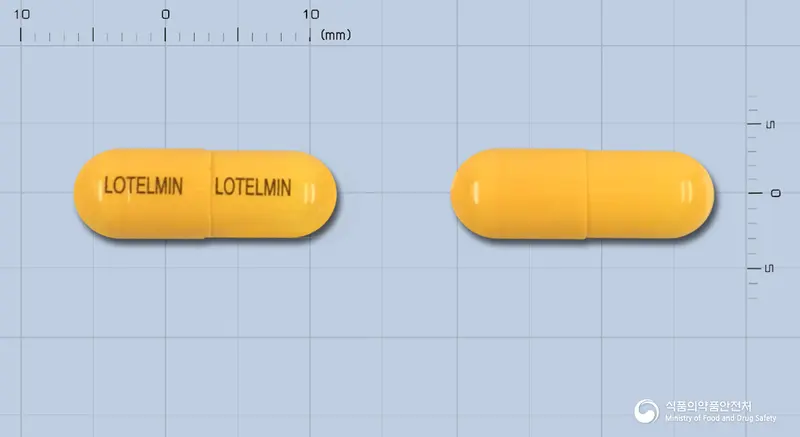 로텔민캡슐 앞뒤 사진 (노란색 캡슐, 각인 LOTELMIN LOTELMIN)