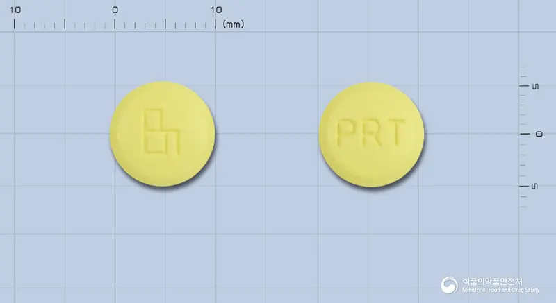 프로라틴정 앞뒤 사진 (노란색 원형, 각인 PRT)